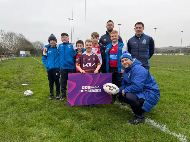 Coaches and players from the U-12s team