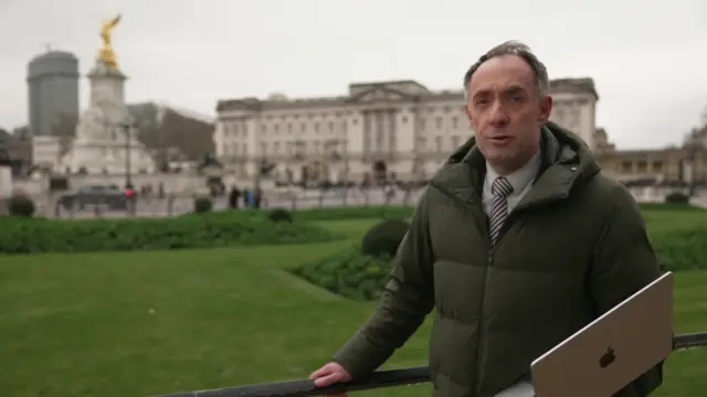 Tom Symonds pictured outside Buckingham Palace