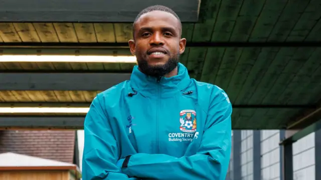 Frank Onyeka in a Coventry tracksuit top after signing on loan from Brentford