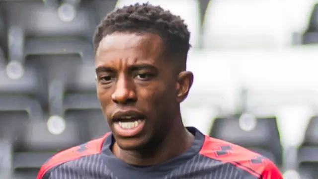 Wes Harding warming-up for Millwall