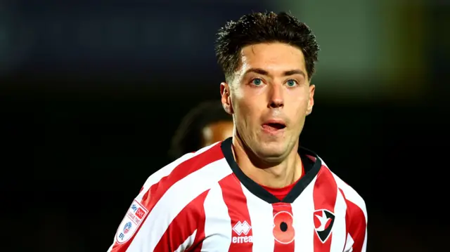 Isaac Hutchinson in action for Cheltenham