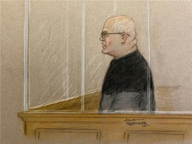 An artist's impression of Steve Wright during a hearing at the Old Bailey court. The image depicts him from a side angle wearing glasses, with some grey short hair around the side of his head and he is wearing a two-toned black and grey sweatshirt.