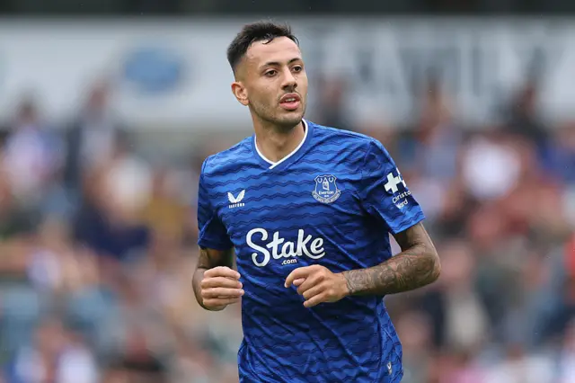 Dwight McNeil wearing a blue Everton shirt