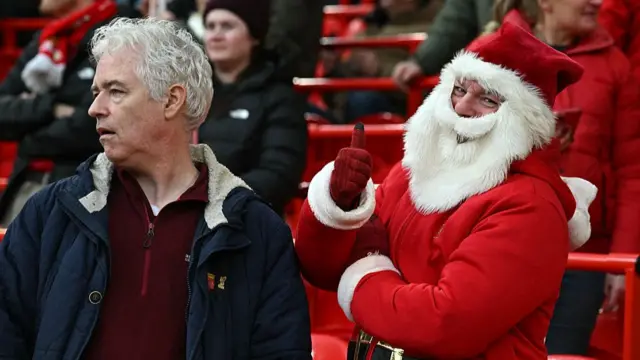 Man dressed as father christmas