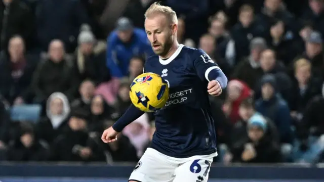 Barry Bannan controls the ball while playing for Millwall