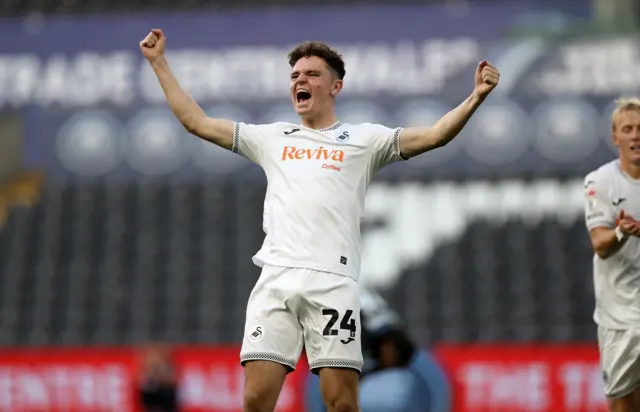 Bobby Wales celebrates scoring for Swansea