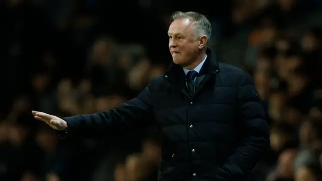 Blackburn boss Michael O'Neill wearing a dark coat on the touchline