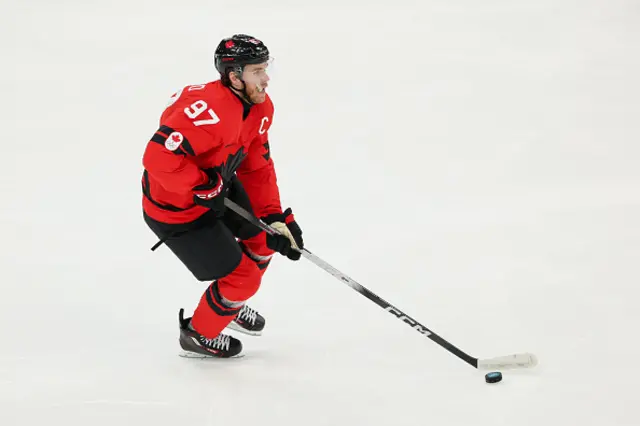 Connor McDavid of Team Canada skates with the puck