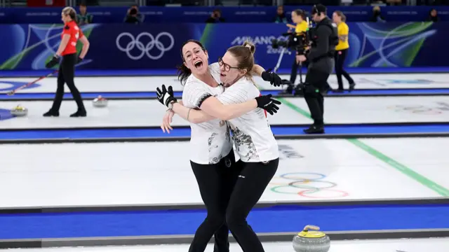 Carole Howald and Alina Paetz of Team Switzerland celebrate