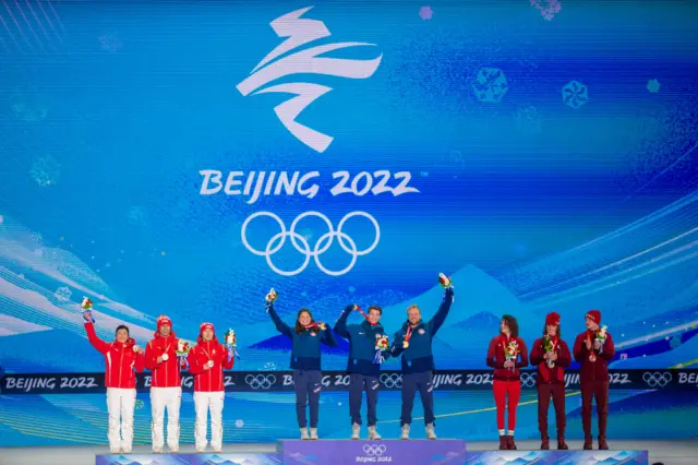 Team USA celebrate gold medal in mixed team aerials at 2022 Winter Olympics in Beijing