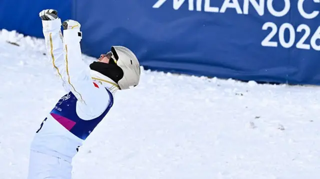 Wang celebrating