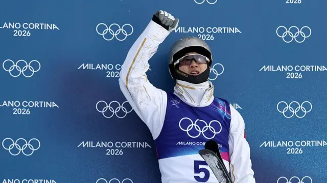 Wang celebrating