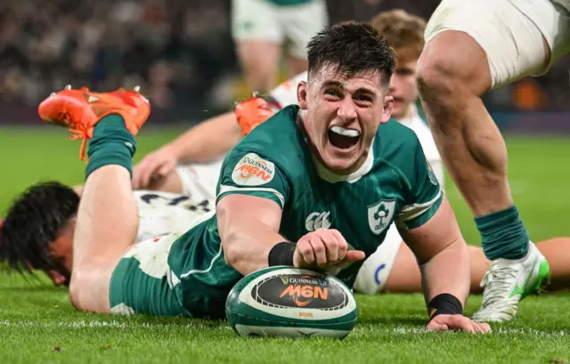 Dan Sheehan celebrates scoring a try for Ireland in 2025