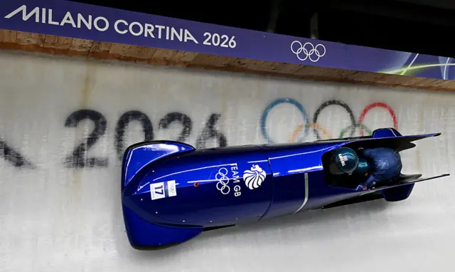 Britain's Adele Nicoll and Britain's Ashleigh Nelson compete in the women's bobsleigh 2-woman heat 1 at Cortina Sliding Centre during the Milano Cortina 2026 Winter Olympic Games in Cortina d'Ampezzo