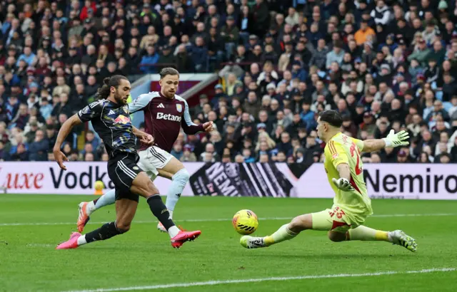 Aston Villa's Emiliano Martinez saves from Leeds