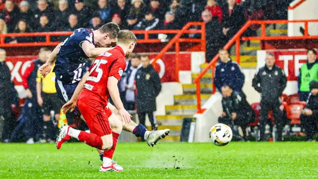 Dundee's Ethan Hamilton scores to make it 3-2 during a William Hill Premiership match between Aberdeen and Dundee at Pittodrie Stadium, on February 21, 2026, in Aberdeen, Scotland