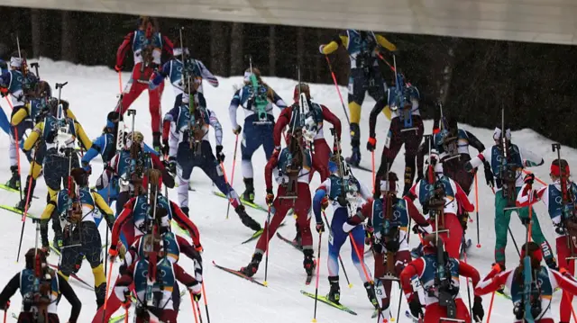 Biathlon athletes in action