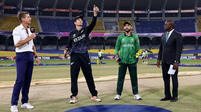 1: Mitchell Santner of New Zealand and Salman Agha of Pakistan take part in the coin toss