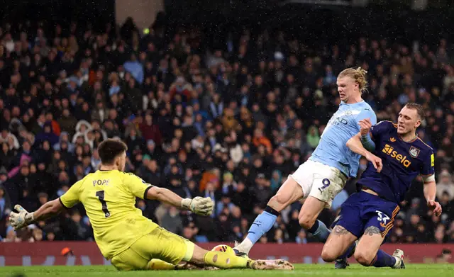 Haaland is denied by a point-blank stop from Pope