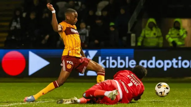 Motherwell's Tawanda Maswanhise is fouled by St Mirren's Shamal George