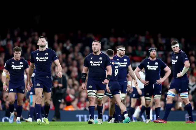 Dejected Scotland leave the pitch