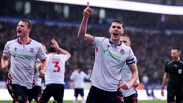 Eoin Toal celebrates his goal for Bolton against Blackpool
