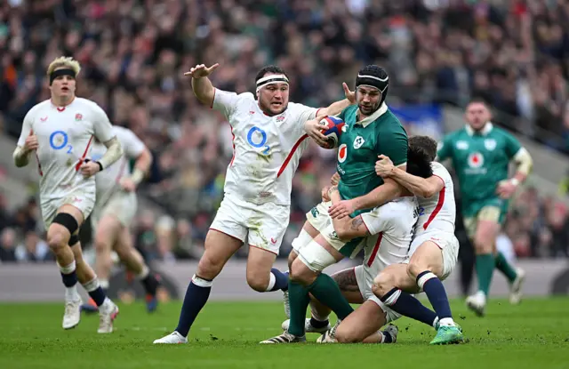 Jamie George going in for a tackle