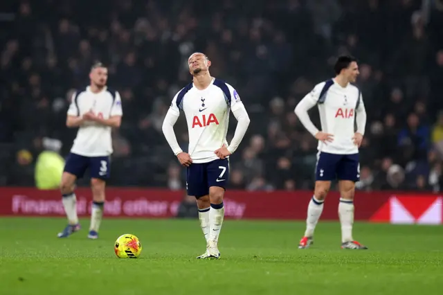Spurs players stand at KO after conceding against Newcastle