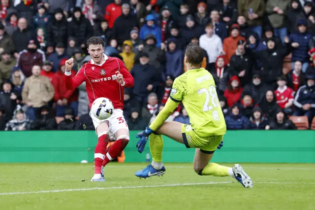 Nathan Broadhead scores for Wrexham against Ipswich to make it 5-3