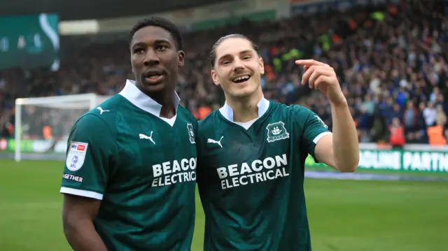 Plymouth's Lorent Tolaj and Bim Pepple celebrating a goal against Cardiff