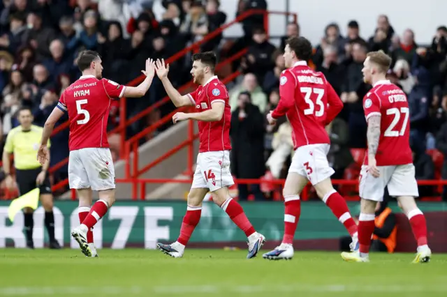 Wrexham celebrate George Thomason's equaliser