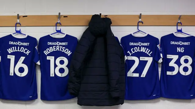 The Cardiff City shirts hanging on pegs inside their changing room at Plymouth