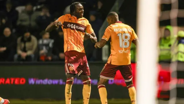 Motherwell's Emmanuel Longelo and Tawanda Maswanhise celebrate