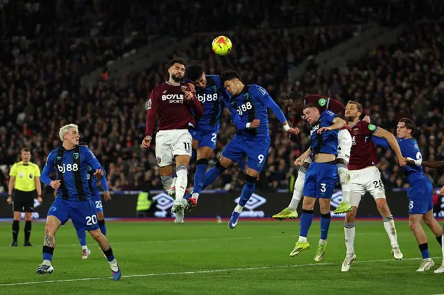 West Ham United's Argentinian striker #11 Taty Castellanos (L) vies with Bournemouth's English defender #23 James Hill (C) and Bournemouth's Brazilian striker #09 Evanilson