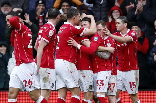 Wrexham celebrate Nathan Broadhead's clinching goal against Ipswich