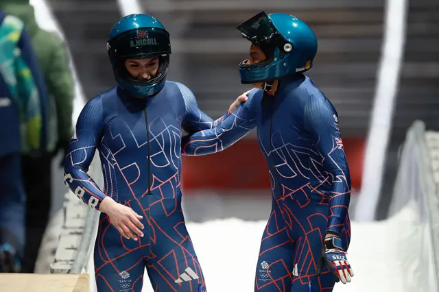 Pilot Adele Nicoll and Ashleigh Nelson of Team Great Britain react