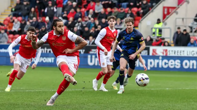 Rotherham United's Sam Nombe convert from the spot for his eighth goal of the season
