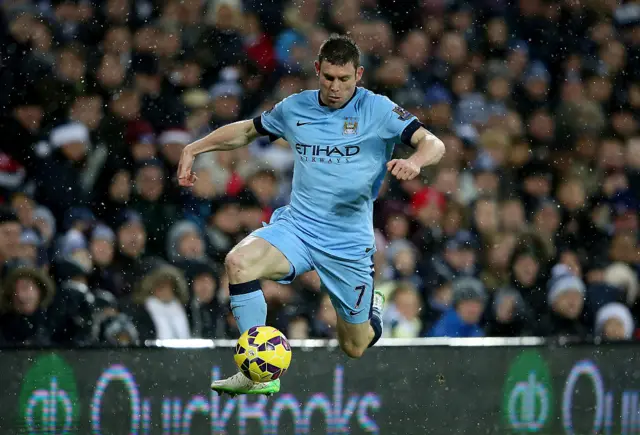 James Milner controlling the ball for Manchester City in the Premier League