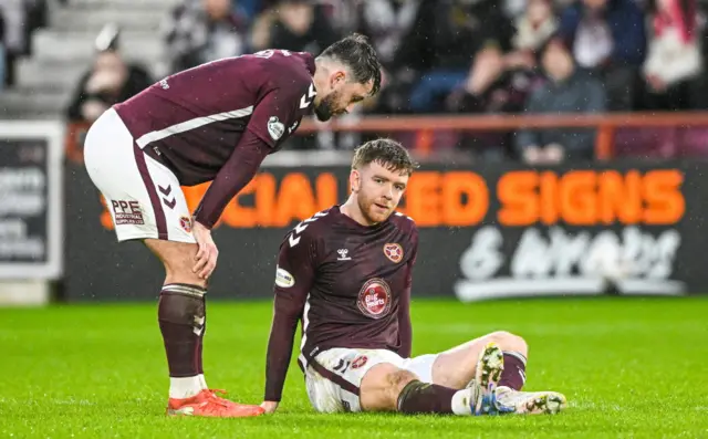 Hearts defender Stuart Findlay has had to go off