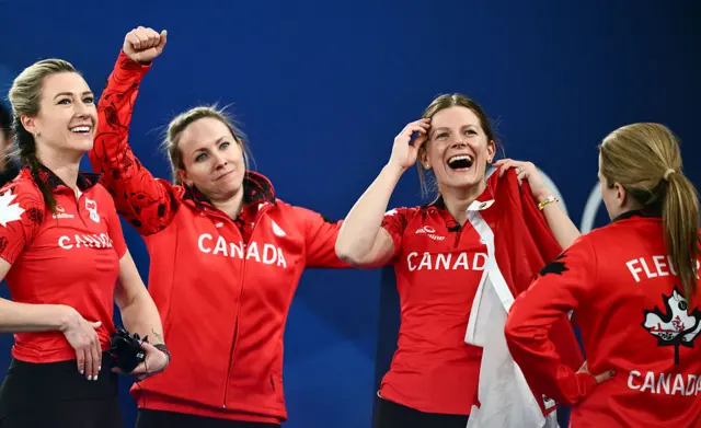 Canada's curling team celebrating