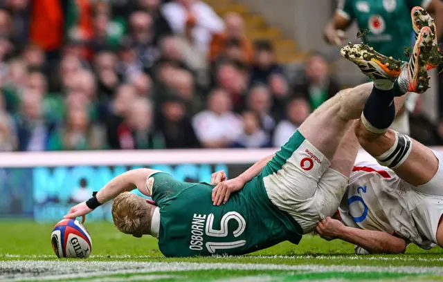 Jamie Osborne of Ireland scores his side's fifth try