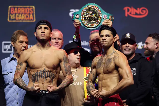 Mario Barrios and Ryan Garcia are shirtless and flexing their muscles