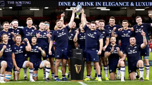 Scotland players hold trophy