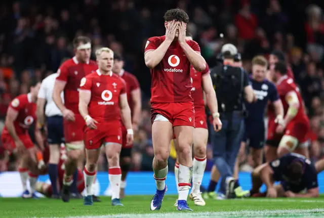 Eddie James with his head in his hands