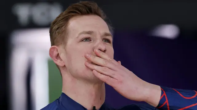 Brad Hall blowing a kiss