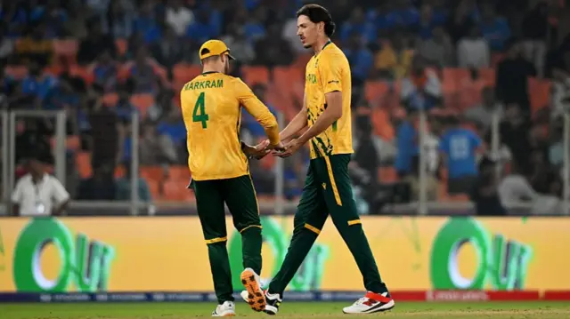 : Marco Jansen and Aiden Markram of South Africa celebrates taking the wicket of Shivam Dube of India