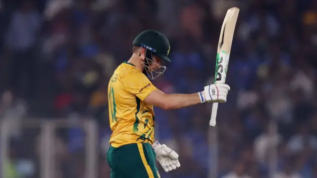 David Miller raises his bat