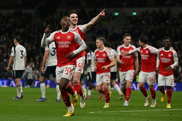 Arsenal's English midfielder #10 Eberechi Eze (front L) celebrates after scoring the team's third goal