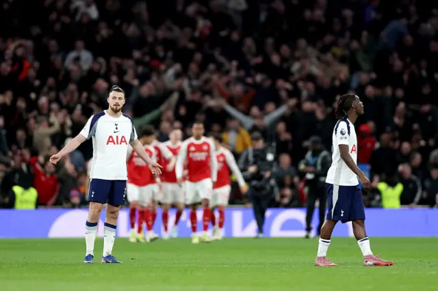 Radu Dragusin of Tottenham Hotspur reacts