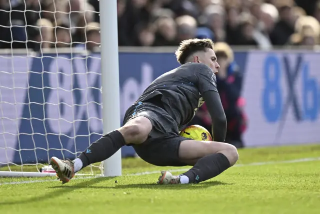 Crystal Palace's Dean Henderson saves a penalty kick